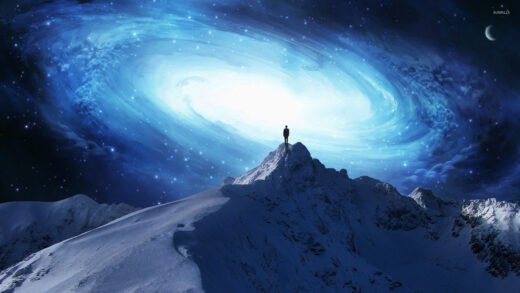 A person standing on top of a mountain with a blue galaxy in the background. A perfect human can reflect God’s attributes.